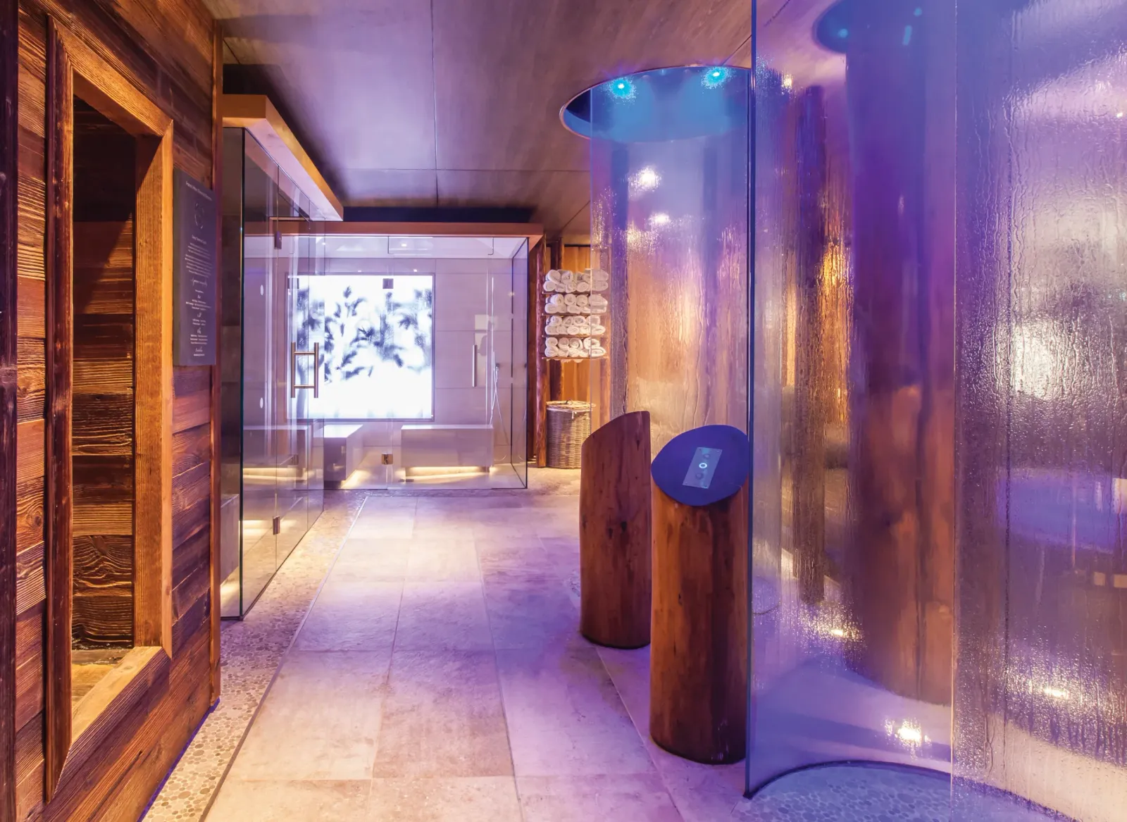 Spa circulation space shaped through spa design consultancy, using natural materials, light and sensory transitions