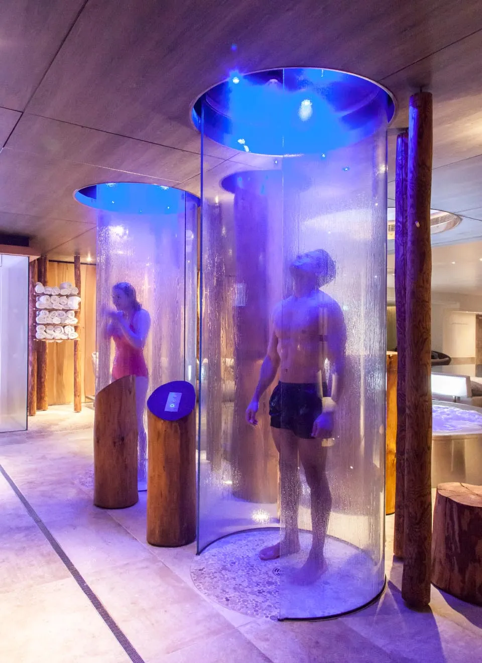 Two people using the experience shower pods at Champneys – Designed by Butterscotch Design