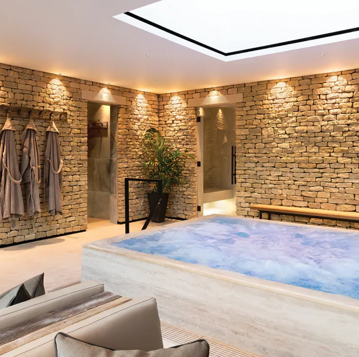 Luxury hydropool design with natural light at Homefield Grange – designed by Butterscotch Design