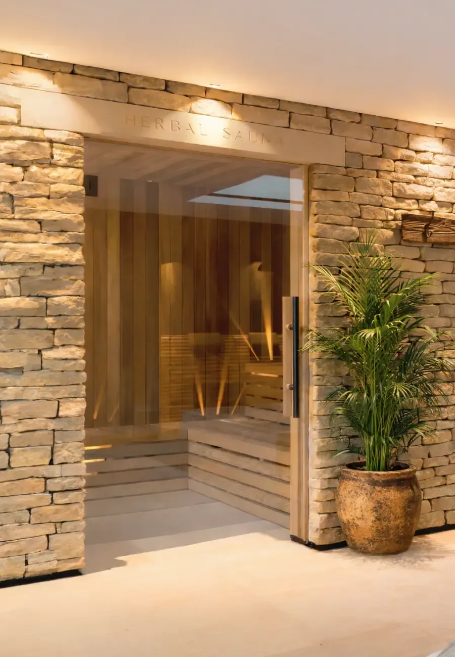 Herbal sauna at Homefield Grange with natural stone walls and bespoke thermal spa design